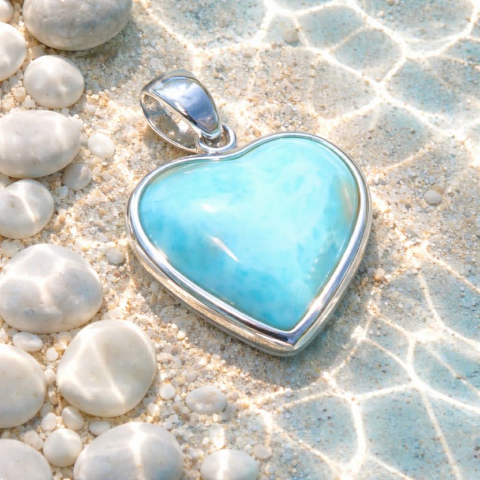 Angel's Heart amazing quality Larimar .925 Sterling Silver handmade pendant - Heart-shaped Larimar pendant on sandy surface with white stones