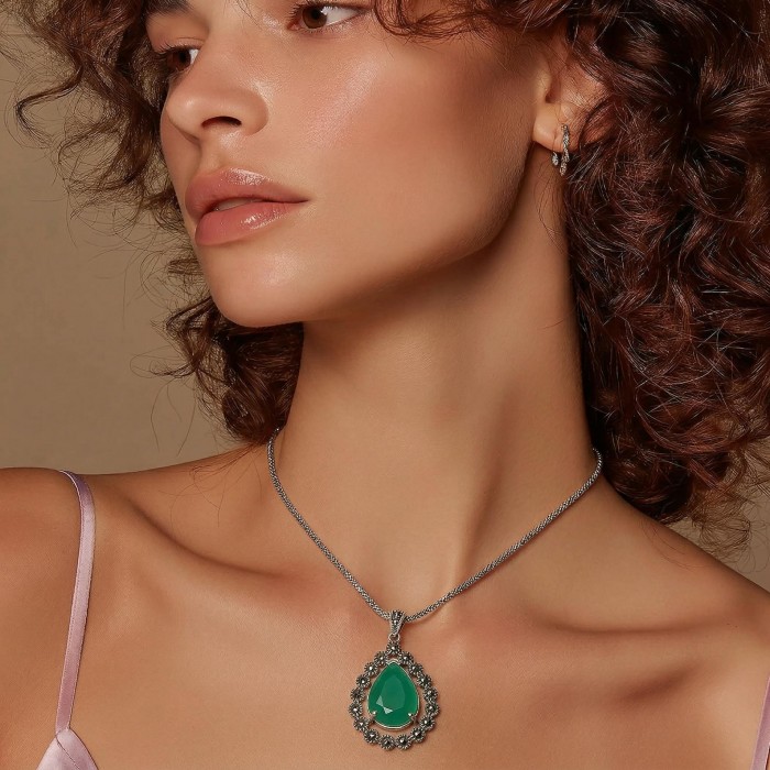 Stella - Very Unique authentic 10.5 carat Jade .925 Sterling Silver handcrafted pendant - Side view of model wearing Stella jade necklace with sterling silver.