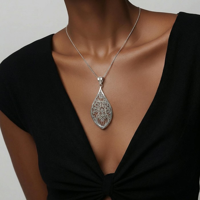 Bali Spirit Large Sterling Beauty .925 Silver Bali handmade Pendant - Sterling silver pendant worn on chest, front view.