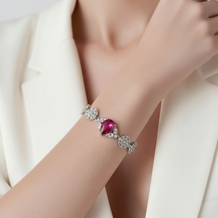 Giovanna - Magnificent Jewel 7.2 carat Ruby .925 Sterling Silver handcrafted incredible Statement Bracelet - Ruby bracelet worn on wrist, close-up view showing details.
