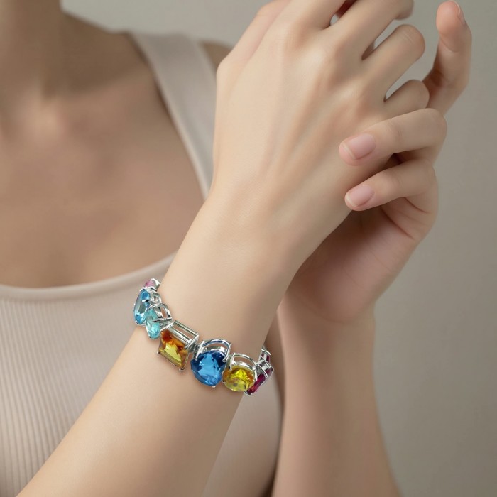 Tutti Frutti 65.5 CARAT MUTIGEM .925 Sterling Silver brilliantly handcrafted Bracelet - Multigem bracelet worn on hand, showcasing colorful stones.