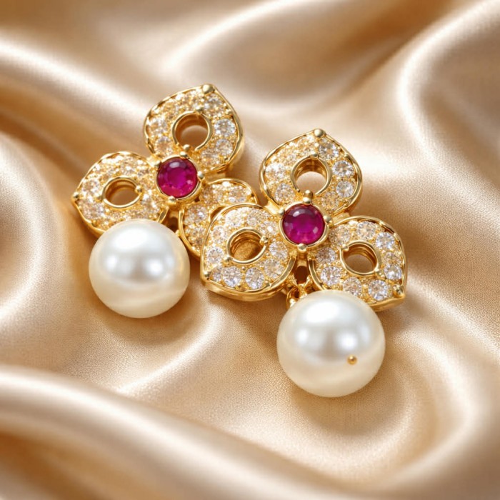 Magnificent Jewel 4.5 carat Ruby 14K Gold over .925 Sterling Silver handcrafted incredible earrings - Gold earrings with rubies and pearls on satin background, close-up view
