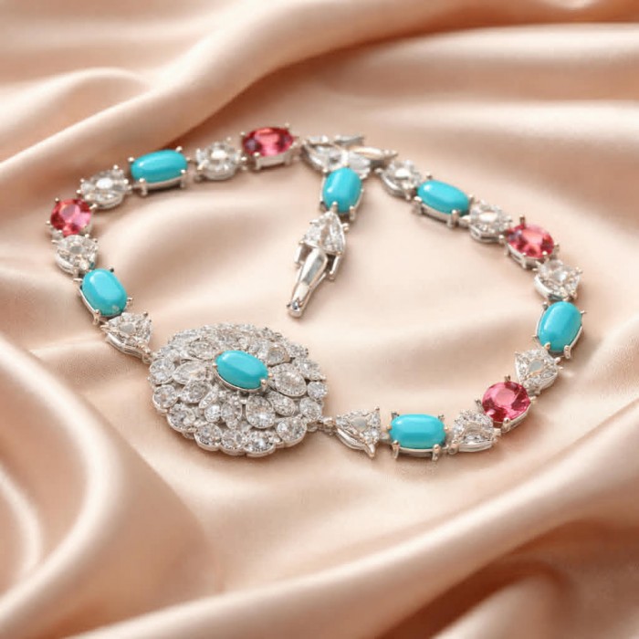 Art Deco - Pacifica - 18.4 carat Sleeping Beauty Turquoise Pink Tourmaline .925 Sterling Silver handmade Statement Bracelet - Necklace on satin, featuring turquoise and pink stones, top view.