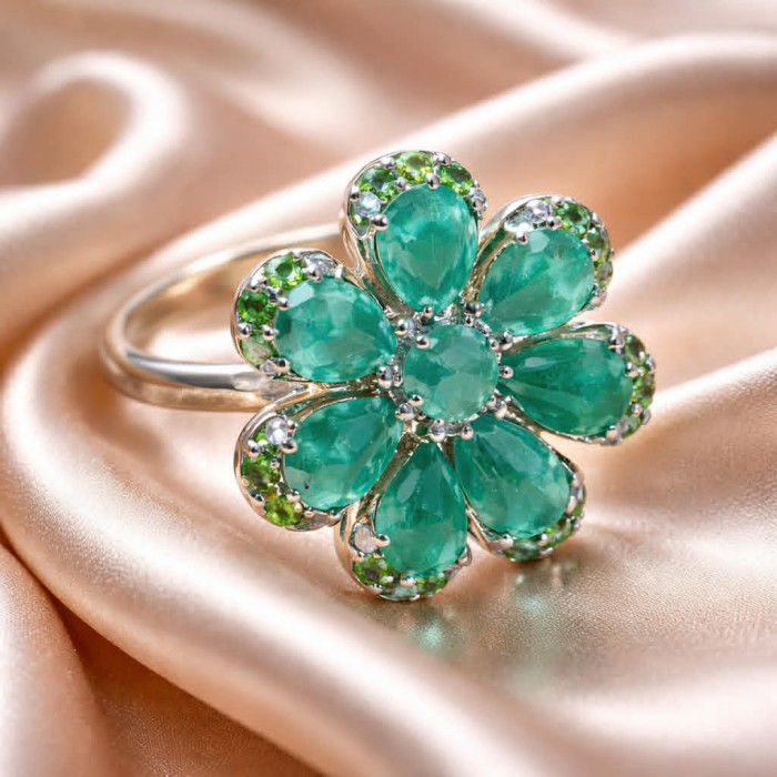 Amazonia - 20.8 carat Colombian Emerald .925 Sterling Silver handmade Statemen .925 Sterling Silver ring size 8 - Emerald flower ring close-up on satin fabric background