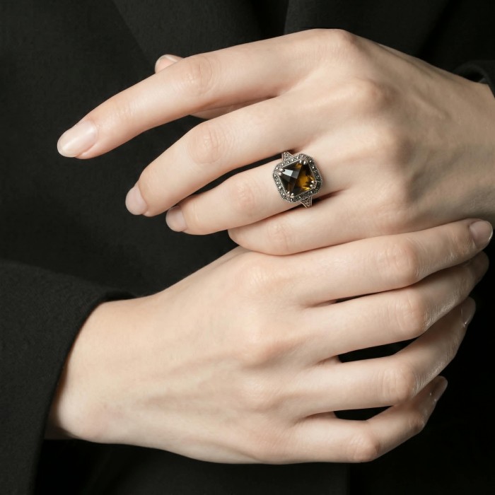 Exotic Beauty oval cut 22.5 carat Helenite .925 Sterling Silver dipped in Real Gold handmade Ring s. 9 - Ring with Helenite stone worn on hand, showing front view.
