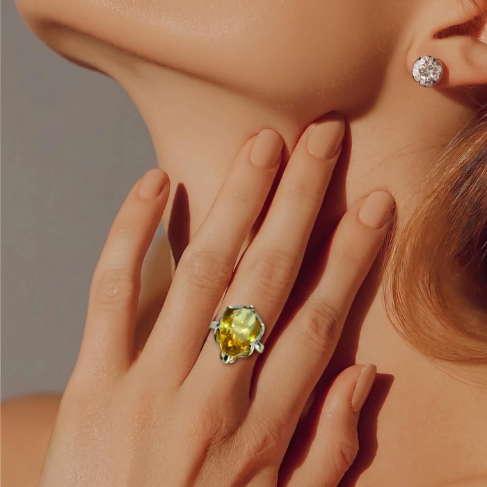 Solid 11.8 carat Genuine Lemon Quartz .925 Sterling Silver handcrafted ring size 7 - Lemon Quartz ring worn on hand, with diamond stud earring visible.