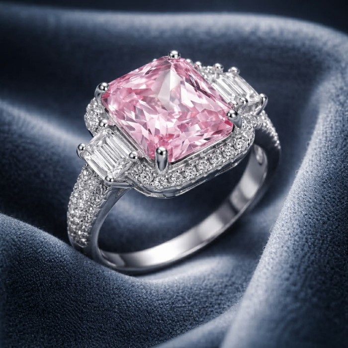 Isabella - Light Pastel 7.7 carat Kunzite .925 Silver handcrafted Cocktail Ring s. 7 1/4 - Close-up of Isabella ring with pink kunzite and silver band on fabric.