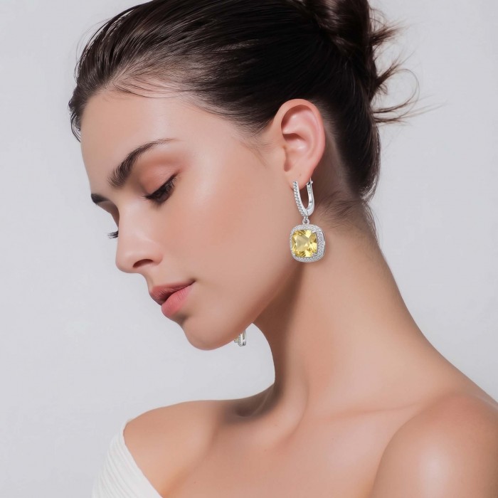 Vivien Luxurious Style - Natural 8.2 carat Citrine .925 Sterling Silver dipped in Rhodium handmade earrings - Side view of woman wearing Vivien Luxurious Style Citrine earrings.