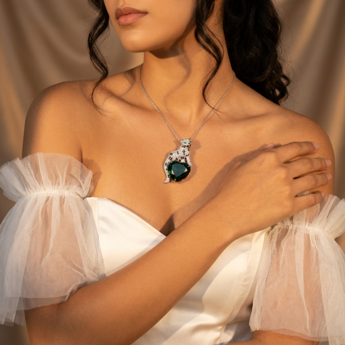 Passionate Love Cheetah authentic 38.5 carat Emerald .925 Sterling Silver Handcrafted pendant brooch - Woman wearing Passionate Love Cheetah necklace with 38.5 carat emerald.
