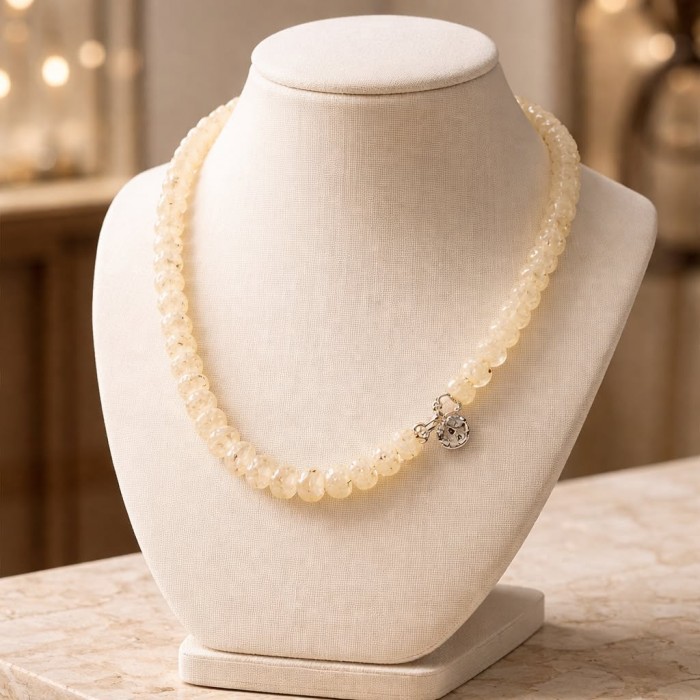 Victoria Authentic 228.5 carat Brazilian Citrine .925 Sterling Silver brilliantly handcrafted Statement necklace - Brazilian Citrine necklace displayed on a stand, front view.