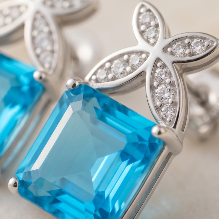 Stella 3.8 carat Swiss Blue Topaz .925 Sterling Silver handmade Earrings - Stone close-up of Swiss Blue Topaz in sterling silver setting.
