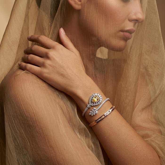 Dolce Vita - Precious Natural 18.5 carat yellow Sapphire .925 Sterling Silver handcrafted LARGE bracelet - Dolce Vita yellow sapphire bracelet worn on wrist, side view.
