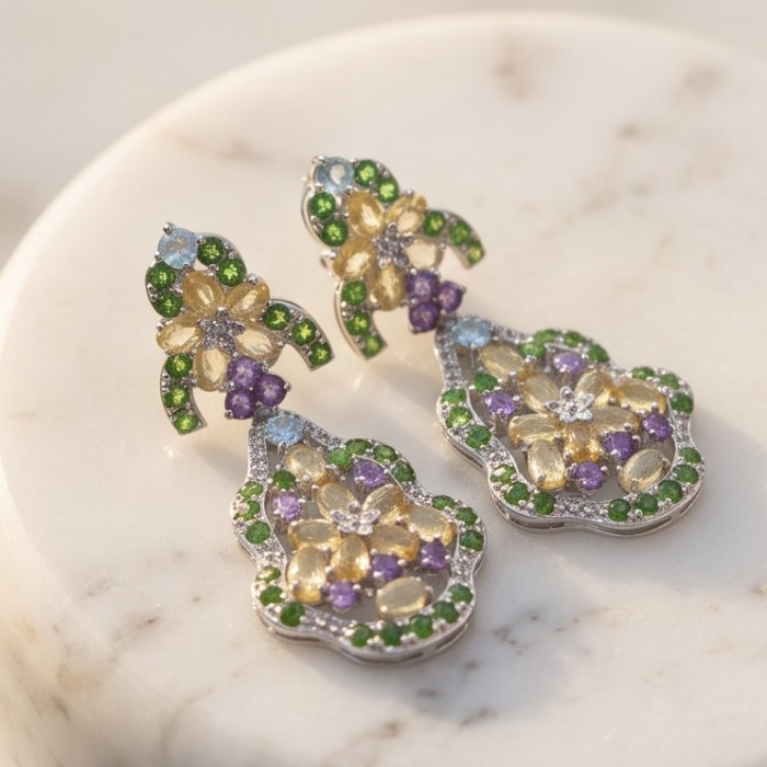 Giovanna - Authentic 18.9 carat Brazilian Citrine .925 Sterling Silver dipped in rhodium handcrafted earrings - Earrings on marble background, showcasing colorful stones and intricate design.