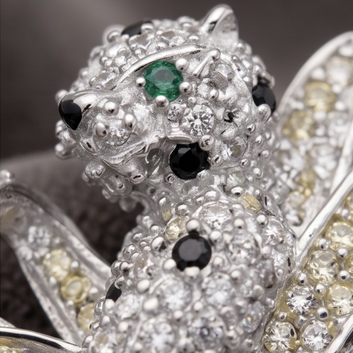 Yellow Cheetah authentic 12.5 carat yellow Sapphire .925 Sterling Silver Handcrafted pendant brooch - Close-up of cheetah-shaped jewelry with sapphires and emerald accent.