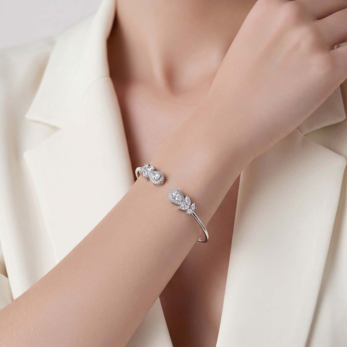 Precious Light Natural 5.2 carat White Topaz .925 Sterling Silver dipped in rhodium bracelet - Bracelet worn on wrist, showcasing white topaz stones and sterling silver.