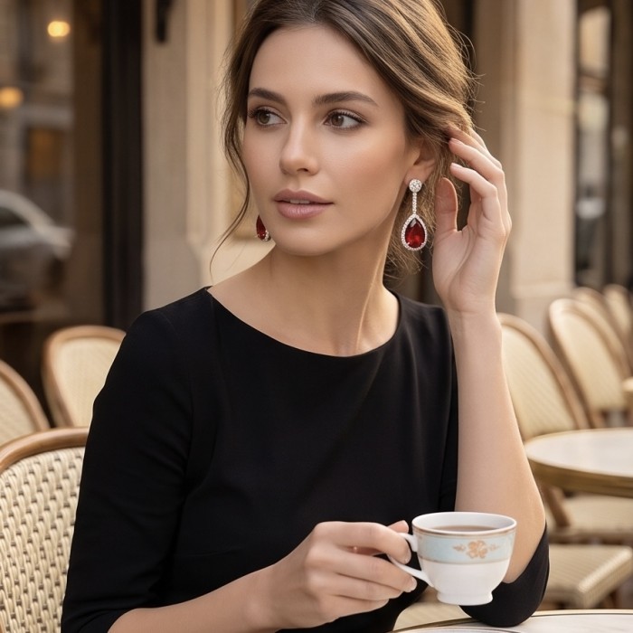 Bella Rossa - Magnificent Jewel 14.5 carat Mozambique Ruby .925 Sterling Silver dippedin Rhodium handcrafted earrings - Woman wearing Bella Rossa earrings with 14.5 ct Mozambique ruby