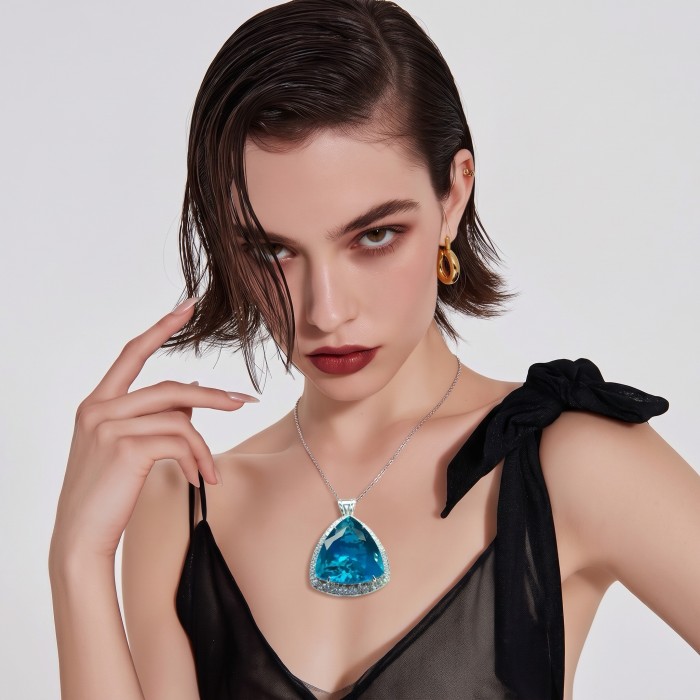 Rare finding! Deluxe 77.2 carat authentic Aquamarine .925 Sterling Silver handmade Statement Pendant - Woman wearing deluxe 77.2 carat aquamarine pendant necklace.