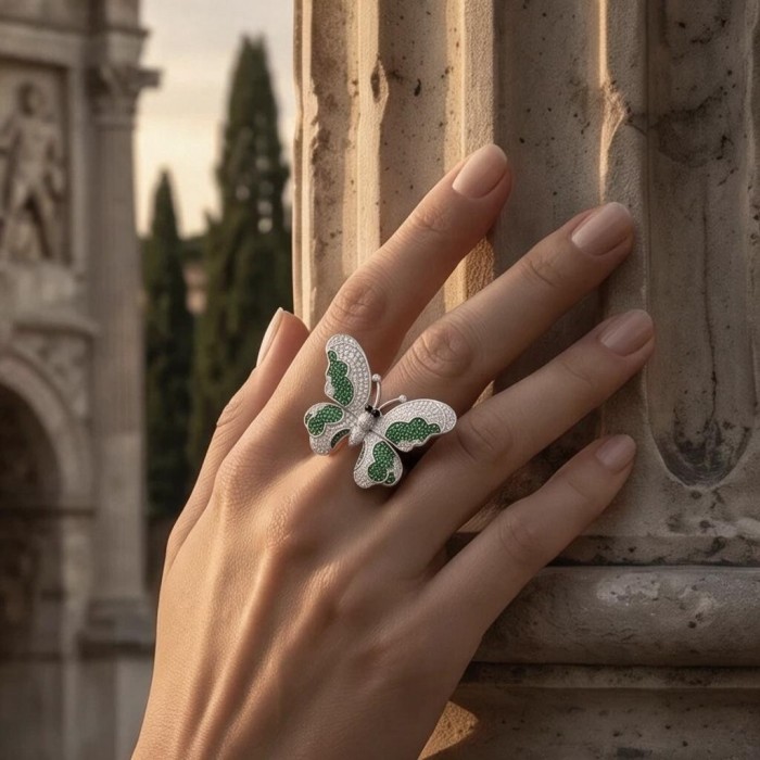 Precious Butterfly Genuine pave 6.5 carat Emerald .925 Sterling Silver handmade LARGE Statement Ring size 6 1/2 - Precious butterfly ring with emeralds, worn on hand against stone background.
