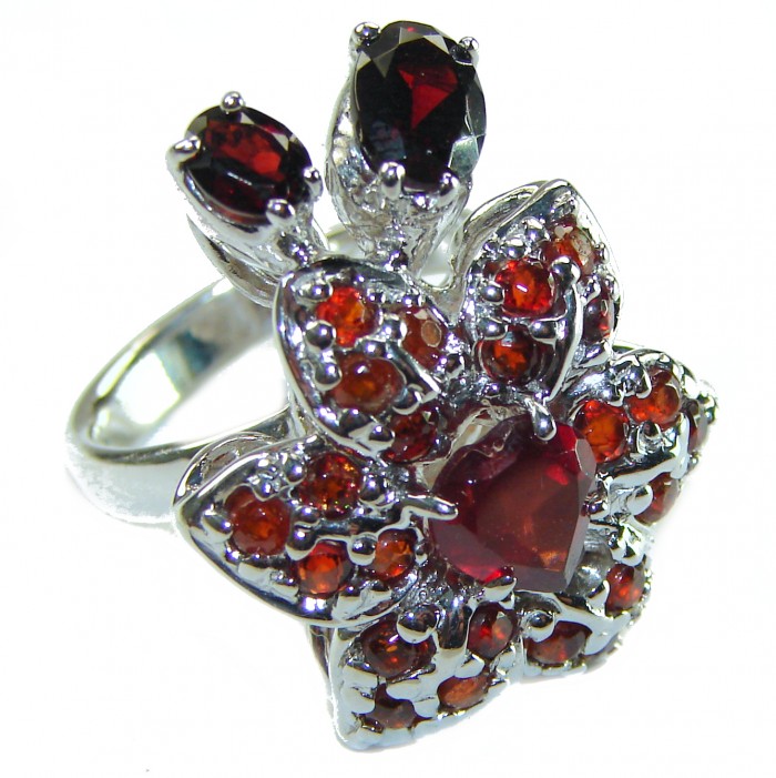 Red Flower Authentic 19.5 carat faceted authentic Australian Garnet .925 Sterling Silver handcrafted ring; s. 6 - Close-up of red gemstone flower ring with heart and oval stones.