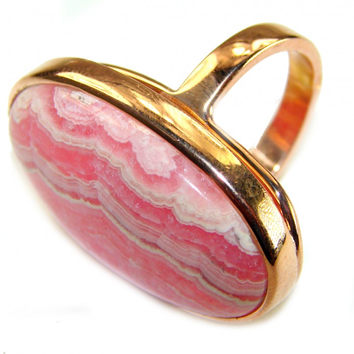 Top quality Argentinian Rhodochrosite 14K Gold over .925 Sterling Silver handmade LARGE ring size 8 adjustable - Close-up of oval Rhodochrosite ring set in 14K gold over silver.