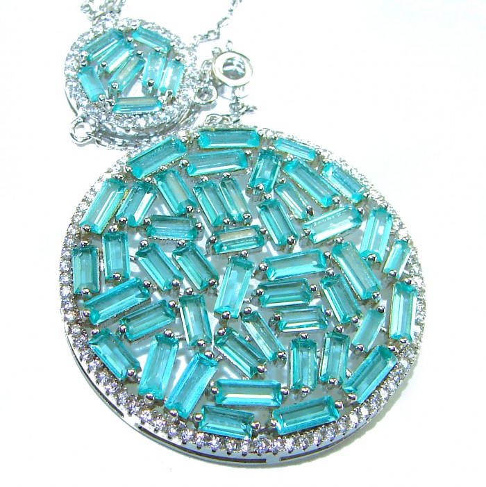 Brazilian's Briliance - Authentic 22.5 carat Aquamarine .925 Sterling Silver handcrafted necklace - Close-up of aquamarine pendant with silver accents.