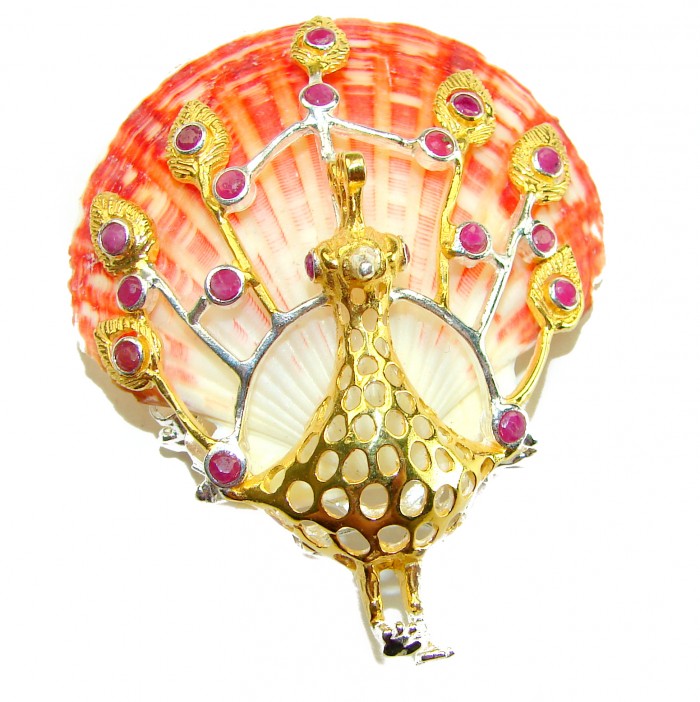 Greaceful Peacock Genuine Ocean Shell Ruby 14K Gold over .925 Sterling Silver handcrafted Pendant brooch - Front view of a peacock brooch with ruby accents and ocean shell detailing.