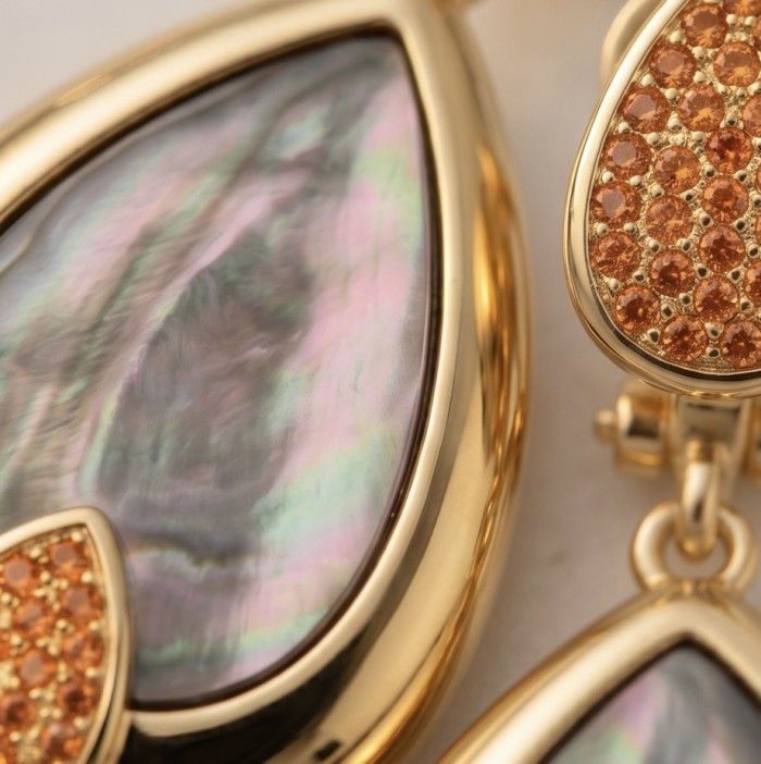 Blue Genuine Rainbow Abalone 18K Gold over .925 Sterling Silver handcrafted Statement Earrings - Close-up of rainbow abalone and orange stones in gold setting.