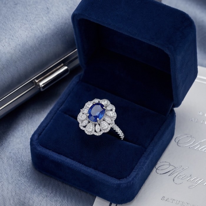 Authentic 4.5 carat Kyanite Moissanite .925 Sterling Silver handcrafted Ring size 9 - Kyanite ring in blue velvet box, top view, white gemstone accents displayed.