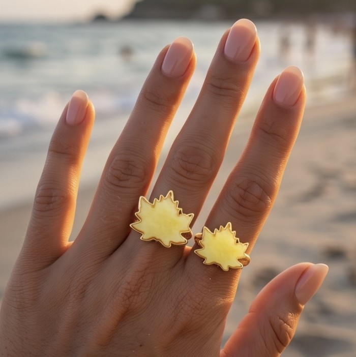 Vintage Style Authentic Golden Butterscotch Baltic Amber 18K Gold over .925 Sterling Silver entirely handcrafted ring; s. 8 ADJUSTABLE - Golden butterscotch amber rings worn on hand, beach background