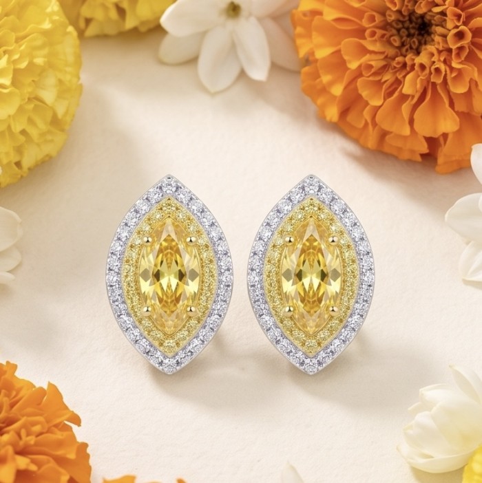 Luxurious 2.4 carat Yellow Sapphire from Ceylon .925 Sterling Silver dipped in Rhodium handcrafted earrings - Front view of yellow sapphire earrings with floral background