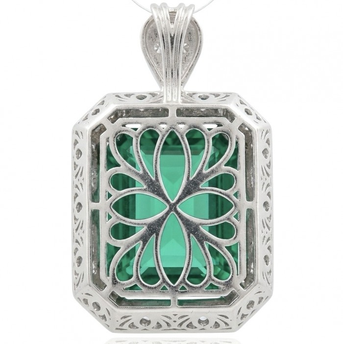 Rare finding! Deluxe 55.2 carat authentic baquette cut Emerald rhodium over .925 Sterling Silver handmade Statement Pendant - Ornate pendant with emerald stone front view