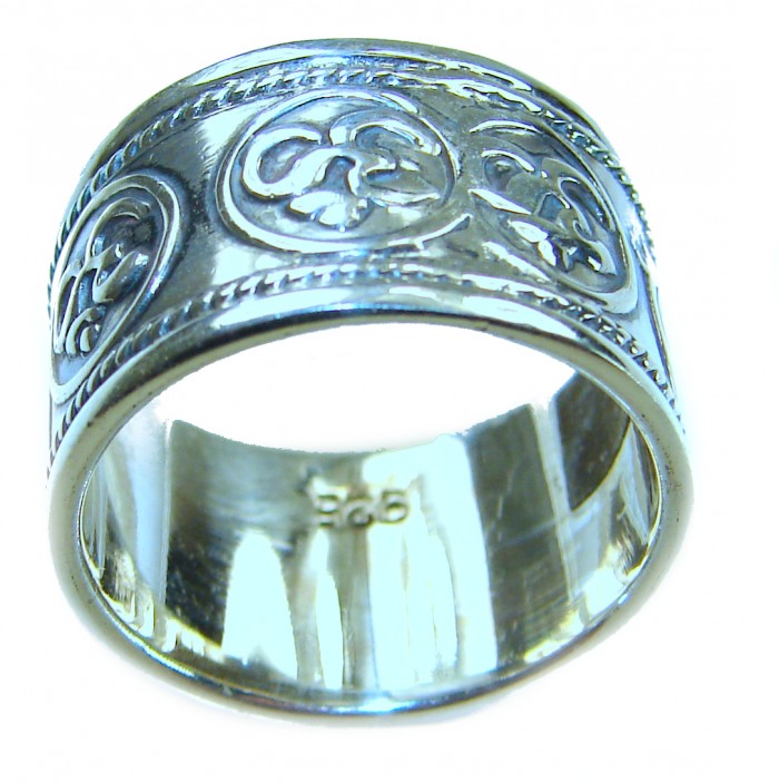 Mantra Large and Solid Bali made .925 Sterling Silver ring size 6 3/4 - Side view of Bali-made .925 sterling silver ring with intricate design.