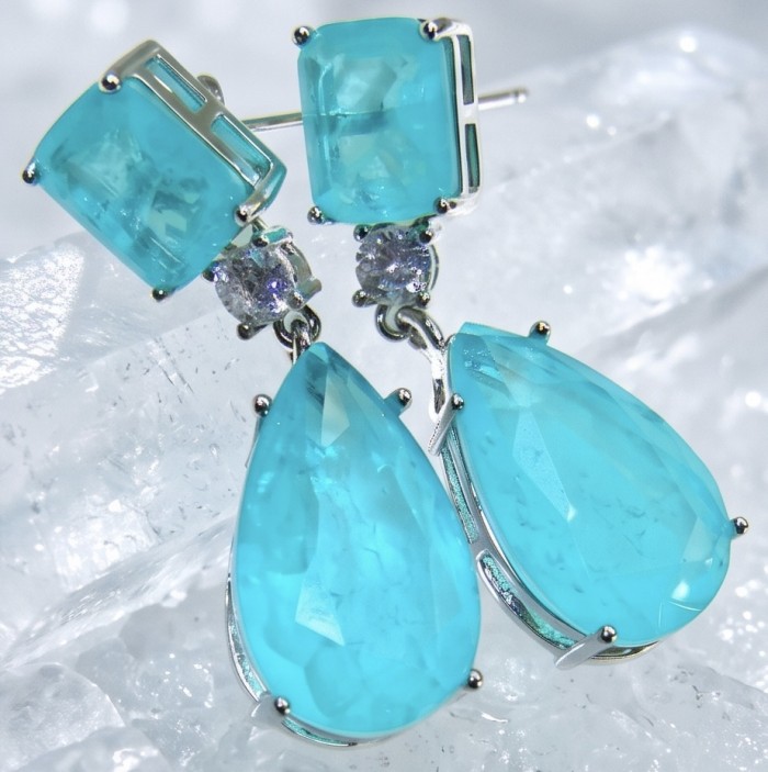 Divine Beauty 18.5 carat Aquamarine .925 Sterling Silver Handcrafted .925 Sterling Silver handcrafted EARRINGS - Close-up of aquamarine earrings with pear and square-cut stones.