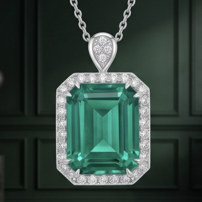 Rare finding! Deluxe 55.2 carat authentic baquette cut Emerald rhodium over .925 Sterling Silver handmade Statement Pendant - Emerald cut pendant with diamond halo, front view on chain.