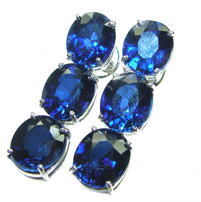 Deep Ocean 16.5 carat London Blue Topaz .925 Sterling Silver handmade Statement earrings - Close-up of Deep Ocean 16.5 carat London Blue Topaz stones in silver setting.