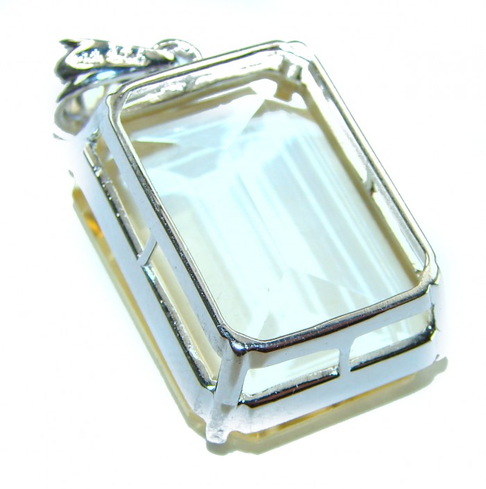 Perfection emerald cut 18.3 carat Lemon Quartz .925 Sterling Silver handcrafted pendant - Side view of emerald cut Lemon Quartz pendant in sterling silver.