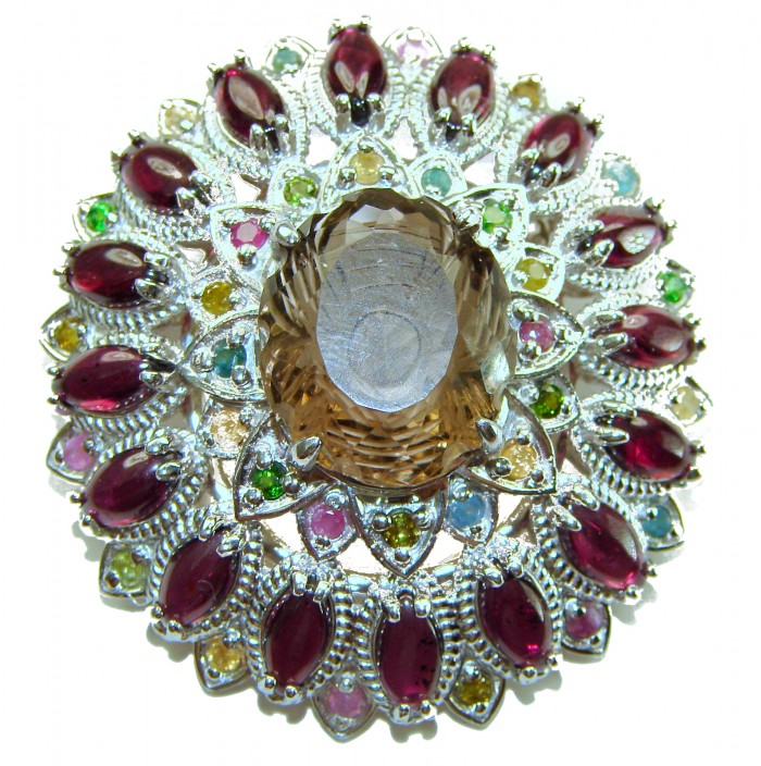 Authentic 45.5 carat carved Smoky Topaz Garnet .925 Sterling Silver handmade Statement Pendant and Brooch - Close-up of carved Smoky Topaz and Garnet brooch in silver setting.
