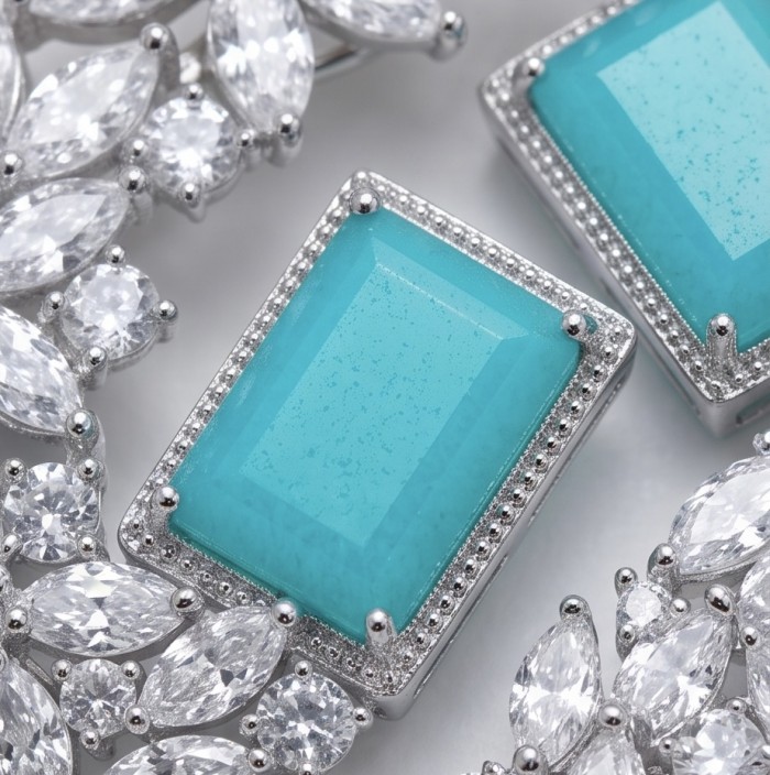Royalty 4.2 carat Paraiba Tourmaline .925 Sterling Silver entirely handmade earrings - Close-up of Paraiba Tourmaline in sterling silver with clear gemstones.