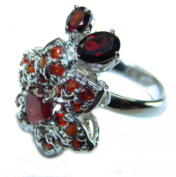 Red Flower Authentic 19.5 carat faceted authentic Australian Garnet .925 Sterling Silver handcrafted ring; s. 6 - Red flower ring with red stones, side view, 19.5 carat, silver setting