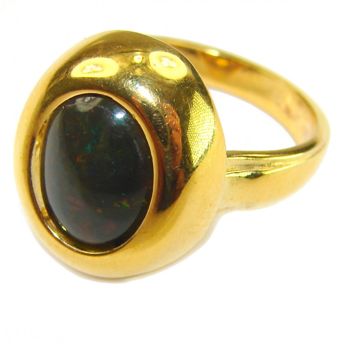 Authentic 11.2ct Black Opal 14K gold over .925 Sterling Silver brilliantly handcrafted ring s. 7 1/4 - Black opal ring in gold setting, top view.