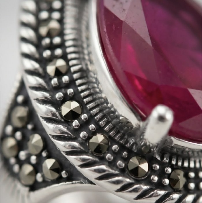 Carmen Natural 18.4 carat Ruby .925 Sterling Silver handmade Large Statement Ring size 8 - Close-up of Carmen Ruby in .925 Sterling Silver with decorative details.