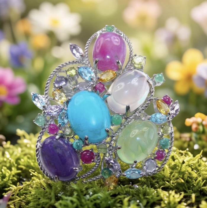 Mademoiselle - Vintage Design 45.4 CARAT Multigem rhodium over .925 Sterling Silver handcrafted Pendant & Brooch - Close-up of vintage multigem rhodium jewelry on a mossy background.