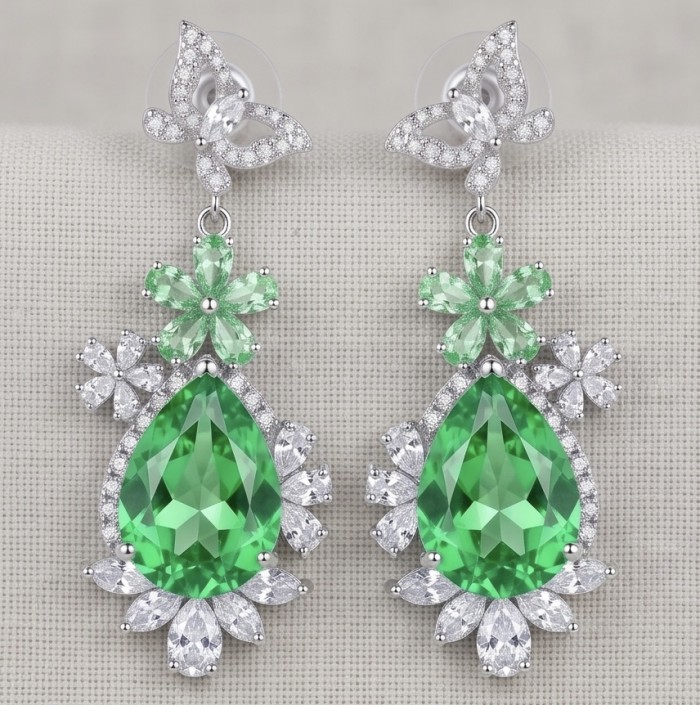 Green Cascade - 18.5 carat Green Topaz rhodium over .925 Sterling Silver handmade Statement earrings - Front view of Green Cascade earrings with 18.5 carat green topaz stones.