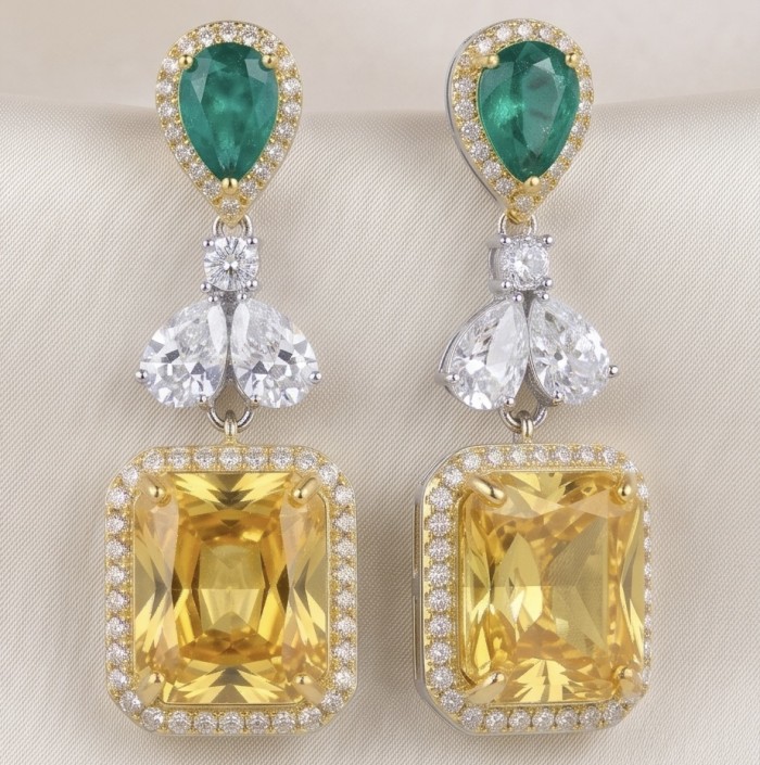 Luxurious 18.5 carat baquette cut Golden - yellow Montana Sapphire 3.8 carat Emerald 18K Gold over .925 Sterling Silver handcrafted earrings - Luxurious earrings with emerald, diamond, and yellow stones, front view.