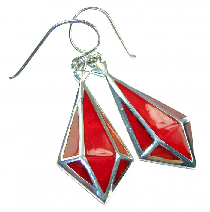 Large Genuine Red Fossilized Coral .925 Sterling Silver handmade earrings - Close-up of red fossilized coral earrings with sterling silver trim.