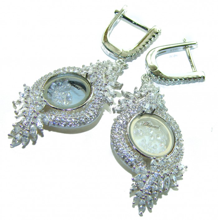 Floating Memories 11.5 carat White Topaz .925 Sterling Silver Handcrafted Statement earrings - Close-up of Chopard earrings with white topaz and sterling silver detailing.