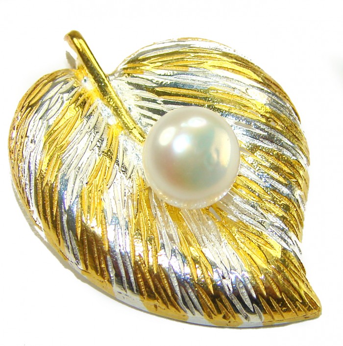 Genuine Pearl 14K Gold .925 Sterling Silver handmade Pendant - Gold and silver leaf pendant with pearl, top view.