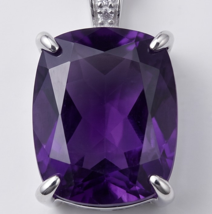 Classic design baquette cut 22.5 carat African Amethyst .925 Sterling Silver dipped in rhodium handcrafted necklace - Close-up of classic pendant with cushion-cut African Amethyst stone