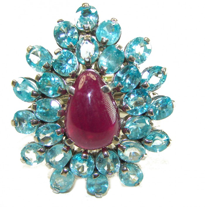 Incredible 29.5 carat Swiss Blue Topaz Ruby .925 Sterling Silver Oversized Ring size 7 3/4 - Front view of a Swiss Blue Topaz and Ruby ring in sterling silver.