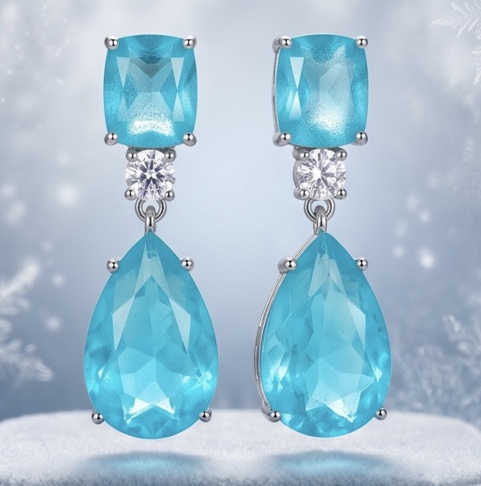 Divine Beauty 18.5 carat Aquamarine .925 Sterling Silver Handcrafted .925 Sterling Silver handcrafted EARRINGS - Aquamarine earrings front view on frosty background.